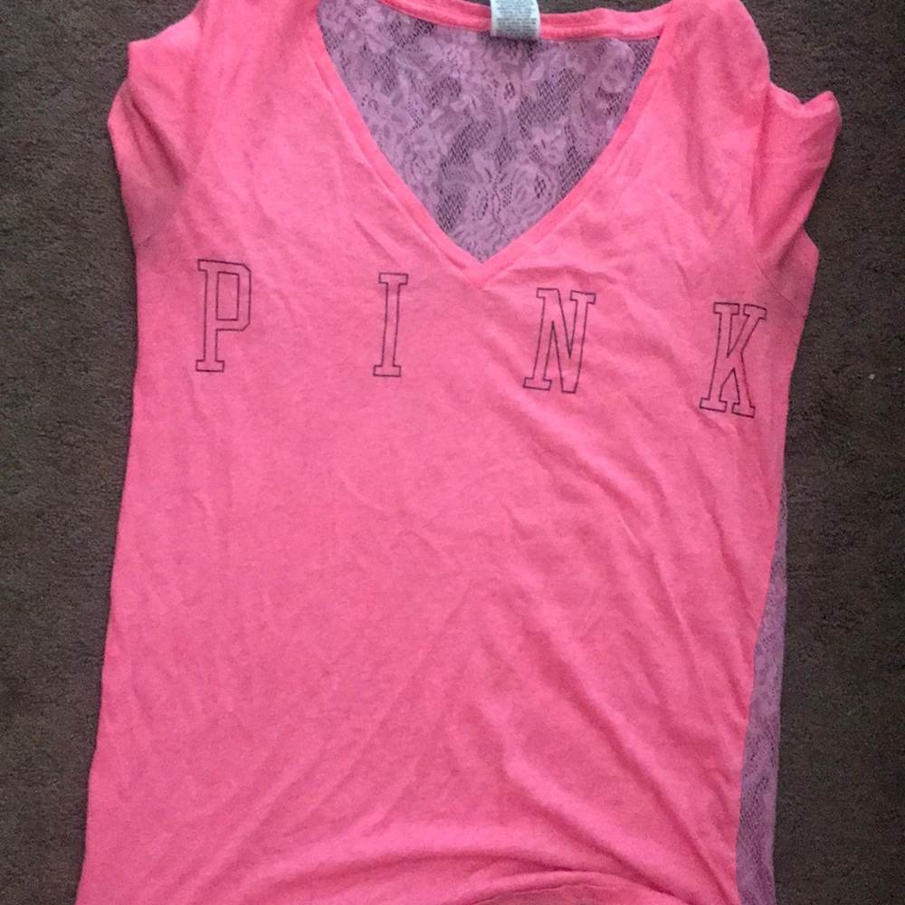 A PINK medium shirt with back lace worn twice